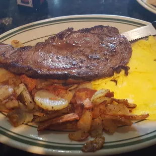 Breakfast steak and eggs.