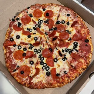 Large pepperoni and black olive.