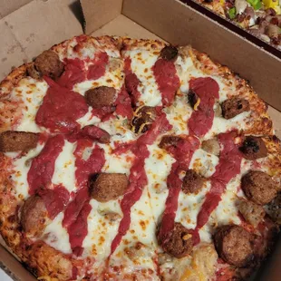 Small meatball pizza