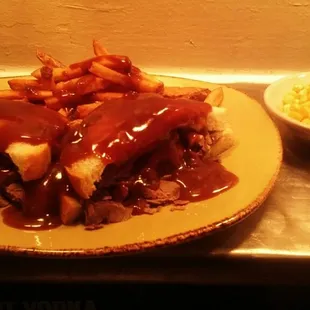 a plate of food and a bowl of macaroni and cheese