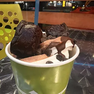Ice cream sandwich flavored fro-yo with brownies, chocolate syrup and choc. Chips