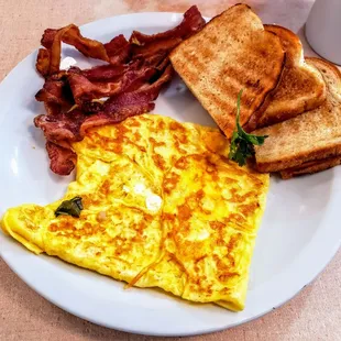 Plain Omelet with Toast and a Side of Bacon at Mickie&apos;s Dairy Bar