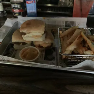 a tray of fries and a sandwich