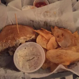 Patty melt with homemade chips and French onion dip. It is a whole patty melt but I took the photo after I ate 1/2 my sandwich. Very good!!