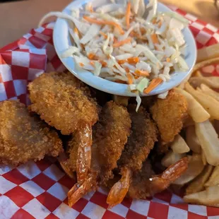 Shrimp butterflied to resemble giant fried tadpoles