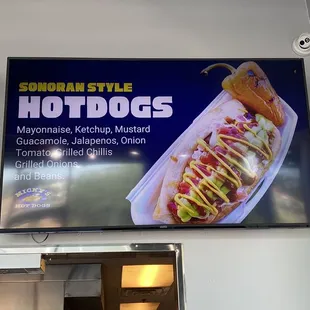 a hot dog with ketchup and mustard