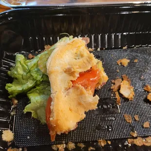 a sandwich in a plastic container