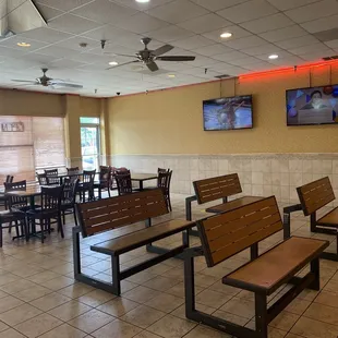 tables and benches in a restaurant