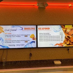 two large tv screens