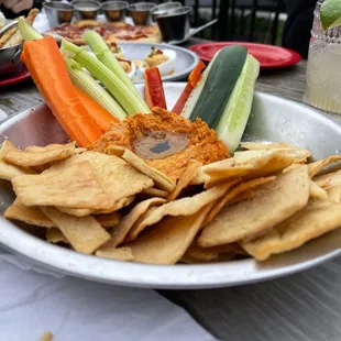 a plate of chips and vegetables