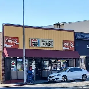 a car parked in front of the store