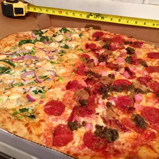 314 SQUARE INCHES, 314 bites, half Shrimp Remoulade &amp; half Meat Monster; very affordable at $20 but the crust gets soggy and sauce is bland.