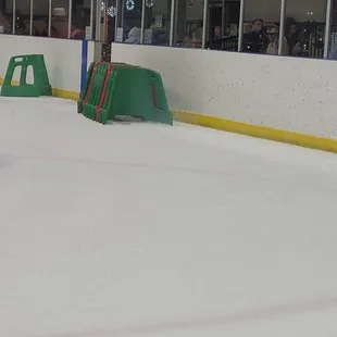 "Helpers" for a small fee to assist with skating