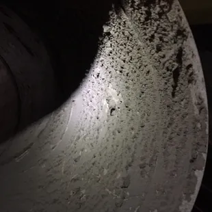 This is an older system's dirty duct work. Give us a call for our duct cleaning services!