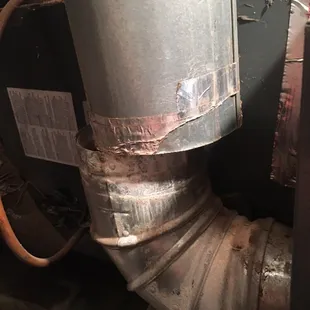 Unbelievable! This furnace has been venting toxic gases since installation! Hire a LICENSED company to have a professional installation.