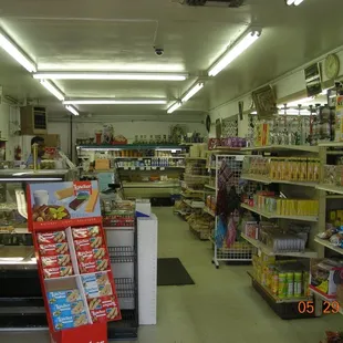 a grocery store with shelves full of goods