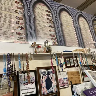 a wall of medals and plaques