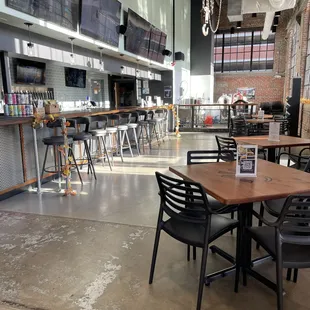 Lots of comfy bar stools at the bar.