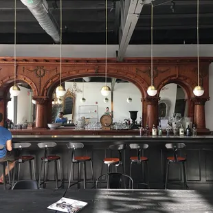 Amazing woodwork behind bar