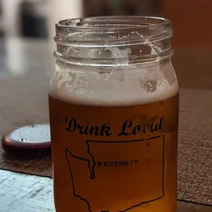 a glass of beer on a table