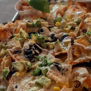 a plate of nachos on a table