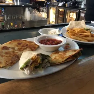 Cowboy quesadilla, turkey avocado wrap w/fries.  We split everything, it didn't come plated this way =)