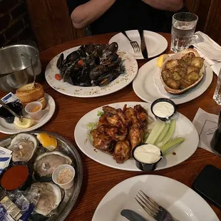 a table full of food and drinks