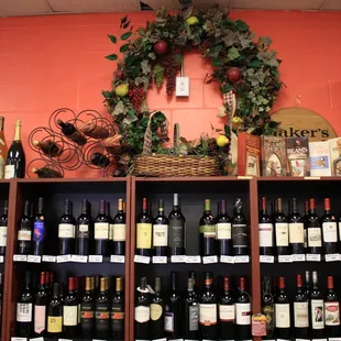 a shelf of wine bottles