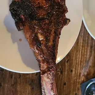 The 48 Oz. Tomahawk Ribeye!! It&apos;s what I came for and it is HUGE!!