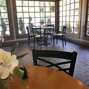 a table and chairs in a restaurant