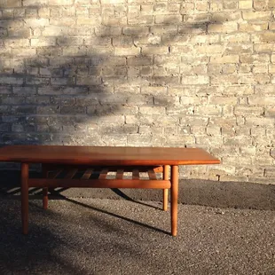 Solid teak coffee table designed by Grete Jalk.