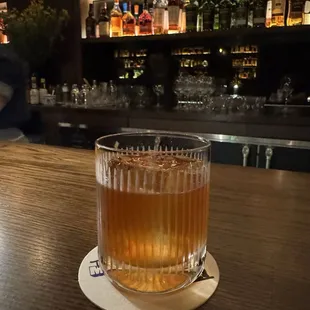 MITARASHI FASHIONED  LAPSANG SOUCHONG TEA INFUSED MALT AND GRAIN, SHIITAKE VEDA MUSHROOM, SOY MAPLE, ANGOSTURA BITTERS, HANAHO-SHISO