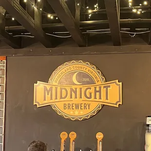 a man pouring a beer