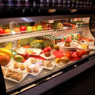 a display case filled with food