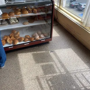 a display case full of pastries