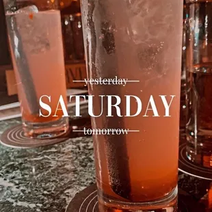 a glass of water with ice in it