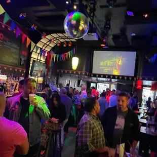 a crowd of people at a bar