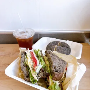 Iced tea, poppy seed bagel cream cheese, smoked turkey sandwich