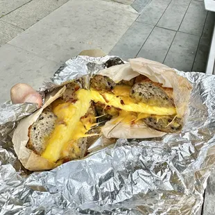 Breakfast sandwich: bacon, egg &amp; cheddar on buckwheat black-sesame bagel  + tax &amp; tip -$14