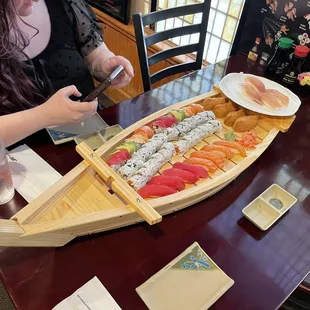 Sushi rolls and Nigiri. That&apos;s a boat load!