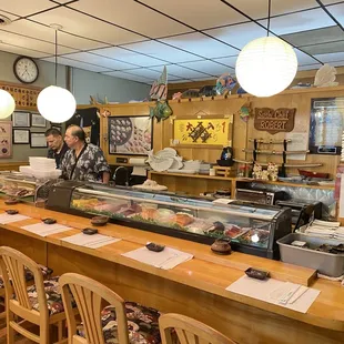 a woman behind the counter