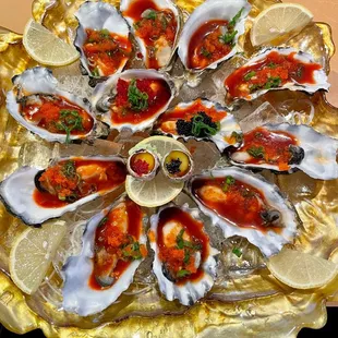 One dozen oysters with quail eggs