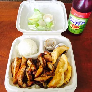 Chicken gyoza combo with a side of fruit punch snapple