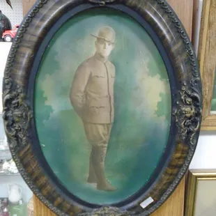 A nice photo of an American Doughboy from WWI, in the original bubble glass frame.