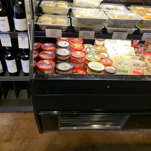 a display of cheeses and wine