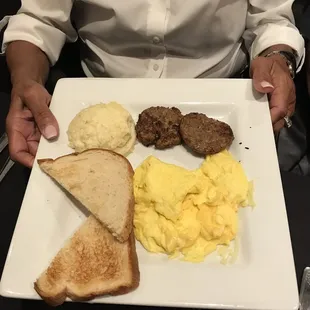 Sourdough toast; scrambled eggs; turkey sausage; gouda grits