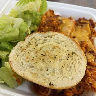 Daily special of lasagna only $8.50, comes with garlic bread and salad.