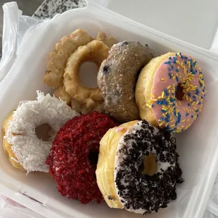 strawberry sprinkle, blueberry cake, old fashion sour cream, white coconut, red velvet, oreo topped