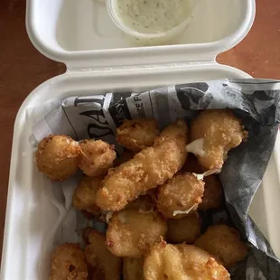 Cheese curds with ranch dressing