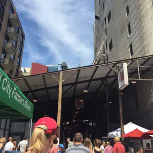a crowd of people walking around